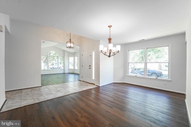 This charming brick and siding single-family home offers the on Heritage Harbour Golf Club in Maryland - for sale on GolfHomes.com, golf home, golf lot