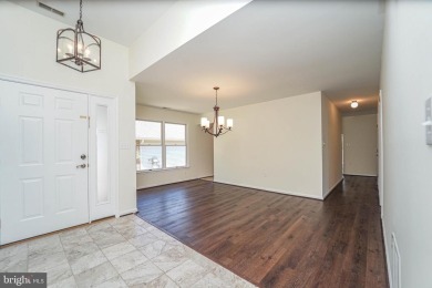 This charming brick and siding single-family home offers the on Heritage Harbour Golf Club in Maryland - for sale on GolfHomes.com, golf home, golf lot