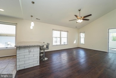 This charming brick and siding single-family home offers the on Heritage Harbour Golf Club in Maryland - for sale on GolfHomes.com, golf home, golf lot