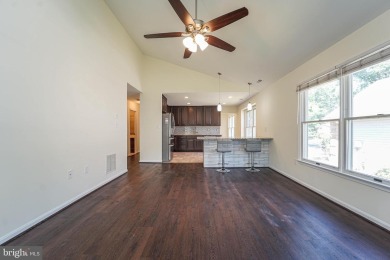 This charming brick and siding single-family home offers the on Heritage Harbour Golf Club in Maryland - for sale on GolfHomes.com, golf home, golf lot