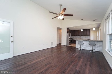 This charming brick and siding single-family home offers the on Heritage Harbour Golf Club in Maryland - for sale on GolfHomes.com, golf home, golf lot