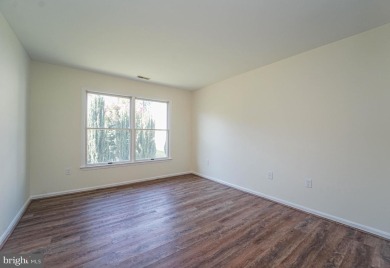 This charming brick and siding single-family home offers the on Heritage Harbour Golf Club in Maryland - for sale on GolfHomes.com, golf home, golf lot