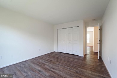 This charming brick and siding single-family home offers the on Heritage Harbour Golf Club in Maryland - for sale on GolfHomes.com, golf home, golf lot
