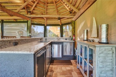 Turnkey RV Lot with Premium Tiki and Lake Views! Enjoy on Motorcoach Resort Golf Course in Florida - for sale on GolfHomes.com, golf home, golf lot