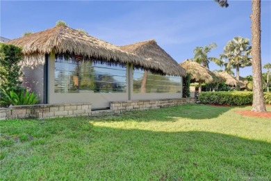 Turnkey RV Lot with Premium Tiki and Lake Views! Enjoy on Motorcoach Resort Golf Course in Florida - for sale on GolfHomes.com, golf home, golf lot