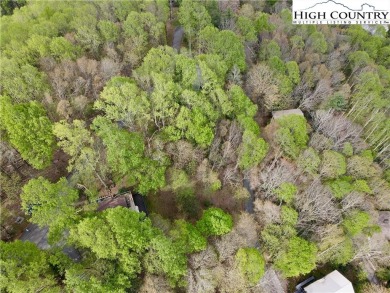 Build your mountain dream getaway on Lot 15 in the gated Crystal on Hound Ears Club Inc. in North Carolina - for sale on GolfHomes.com, golf home, golf lot