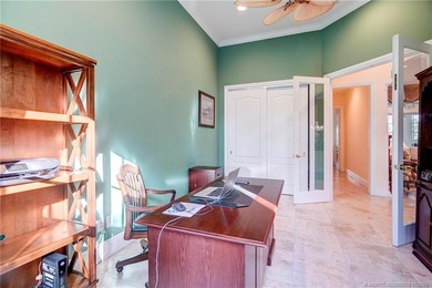 Luxury lakeside living awaits in this 5-bedroom, 3 full and 2 on Willoughby Golf Club in Florida - for sale on GolfHomes.com, golf home, golf lot