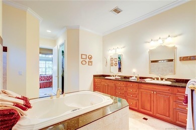 Luxury lakeside living awaits in this 5-bedroom, 3 full and 2 on Willoughby Golf Club in Florida - for sale on GolfHomes.com, golf home, golf lot