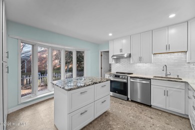 This beautiful brick ranch is tucked away in The Woodlands on Country Club of North Carolina in North Carolina - for sale on GolfHomes.com, golf home, golf lot