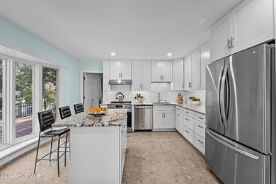 This beautiful brick ranch is tucked away in The Woodlands on Country Club of North Carolina in North Carolina - for sale on GolfHomes.com, golf home, golf lot