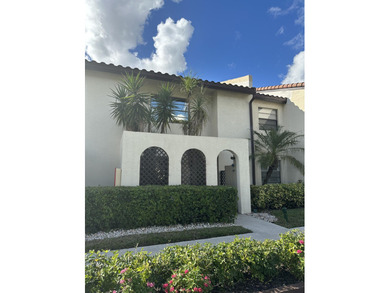 Welcome to this light and bright 2BR/2.5BA lakefront townhouse on Boca Lago Golf and Country Club in Florida - for sale on GolfHomes.com, golf home, golf lot