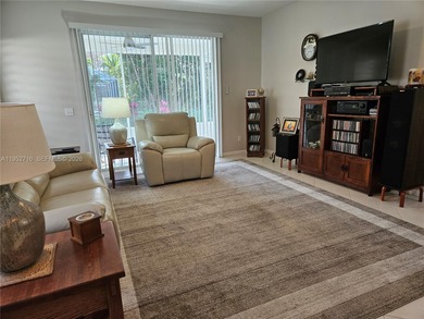 Lovely 3BR/2BA/2CG villa in the gated community of Summerfield on Champions Club at Summerfield in Florida - for sale on GolfHomes.com, golf home, golf lot