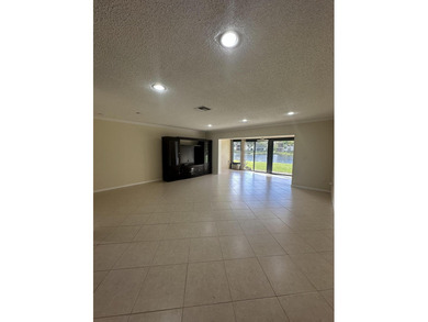 Welcome to this light and bright 2BR/2.5BA lakefront townhouse on Boca Lago Golf and Country Club in Florida - for sale on GolfHomes.com, golf home, golf lot