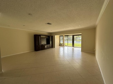 Welcome to this light and bright 2BR/2.5BA lakefront townhouse on Boca Lago Golf and Country Club in Florida - for sale on GolfHomes.com, golf home, golf lot