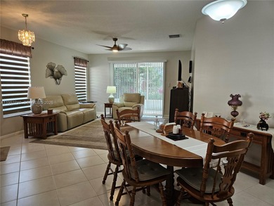 Lovely 3BR/2BA/2CG villa in the gated community of Summerfield on Champions Club at Summerfield in Florida - for sale on GolfHomes.com, golf home, golf lot