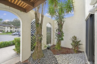 Welcome to this light and bright 2BR/2.5BA lakefront townhouse on Boca Lago Golf and Country Club in Florida - for sale on GolfHomes.com, golf home, golf lot
