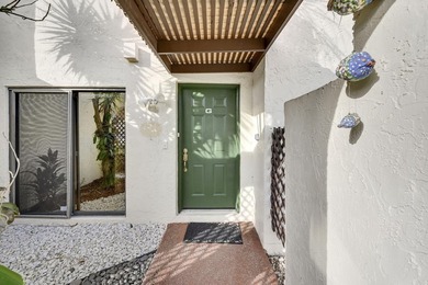 Welcome to this light and bright 2BR/2.5BA lakefront townhouse on Boca Lago Golf and Country Club in Florida - for sale on GolfHomes.com, golf home, golf lot