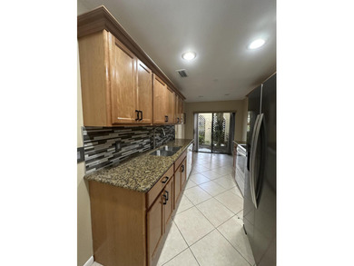 Welcome to this light and bright 2BR/2.5BA lakefront townhouse on Boca Lago Golf and Country Club in Florida - for sale on GolfHomes.com, golf home, golf lot