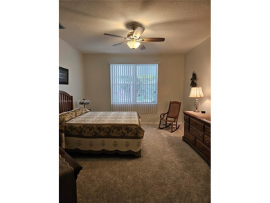 Lovely 3BR/2BA/2CG villa in the gated community of Summerfield on Champions Club at Summerfield in Florida - for sale on GolfHomes.com, golf home, golf lot