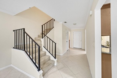 Welcome to this light and bright 2BR/2.5BA lakefront townhouse on Boca Lago Golf and Country Club in Florida - for sale on GolfHomes.com, golf home, golf lot
