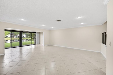 Welcome to this light and bright 2BR/2.5BA lakefront townhouse on Boca Lago Golf and Country Club in Florida - for sale on GolfHomes.com, golf home, golf lot