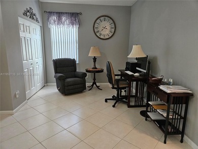 Lovely 3BR/2BA/2CG villa in the gated community of Summerfield on Champions Club at Summerfield in Florida - for sale on GolfHomes.com, golf home, golf lot