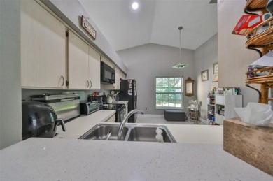 Under contract-accepting backup offers. Professionally cleaned on Hunters Green Country Club in Florida - for sale on GolfHomes.com, golf home, golf lot