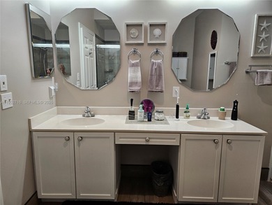 Lovely 3BR/2BA/2CG villa in the gated community of Summerfield on Champions Club at Summerfield in Florida - for sale on GolfHomes.com, golf home, golf lot