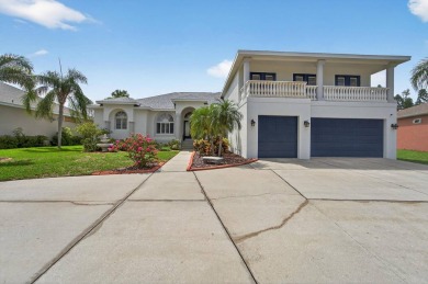 4 Beds | 3 Baths | Office/Den | 3-Car Garage | Views of Pond and on Apollo Beach Golf and Sea Club in Florida - for sale on GolfHomes.com, golf home, golf lot