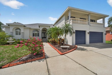 4 Beds | 3 Baths | Office/Den | 3-Car Garage | Views of Pond and on Apollo Beach Golf and Sea Club in Florida - for sale on GolfHomes.com, golf home, golf lot