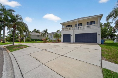 4 Beds | 3 Baths | Office/Den | 3-Car Garage | Views of Pond and on Apollo Beach Golf and Sea Club in Florida - for sale on GolfHomes.com, golf home, golf lot