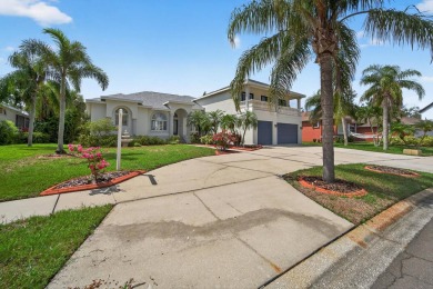 4 Beds | 3 Baths | Office/Den | 3-Car Garage | Views of Pond and on Apollo Beach Golf and Sea Club in Florida - for sale on GolfHomes.com, golf home, golf lot