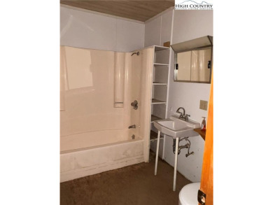 2bdr/1 1/2 bath cottage with great covered porch overlooking the on Land Harbor Golf Course in North Carolina - for sale on GolfHomes.com, golf home, golf lot