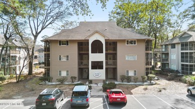 Discover your perfect retreat in this beautifully appointed on Oyster Bay Golf Links in North Carolina - for sale on GolfHomes.com, golf home, golf lot