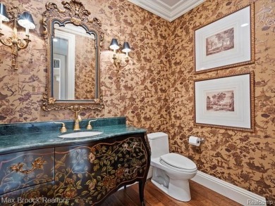 This exquisite French Country-inspired residence is situated on Forest Lake Country Club in Michigan - for sale on GolfHomes.com, golf home, golf lot