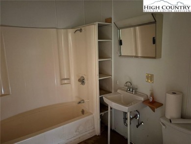2bdr/1 1/2 bath cottage with great covered porch overlooking the on Land Harbor Golf Course in North Carolina - for sale on GolfHomes.com, golf home, golf lot