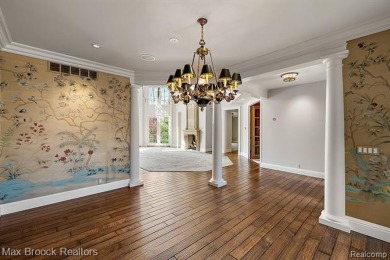 This exquisite French Country-inspired residence is situated on Forest Lake Country Club in Michigan - for sale on GolfHomes.com, golf home, golf lot