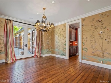 This exquisite French Country-inspired residence is situated on Forest Lake Country Club in Michigan - for sale on GolfHomes.com, golf home, golf lot
