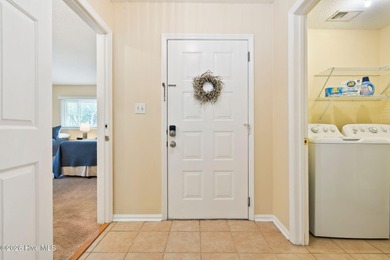 Discover your perfect retreat in this beautifully appointed on Oyster Bay Golf Links in North Carolina - for sale on GolfHomes.com, golf home, golf lot