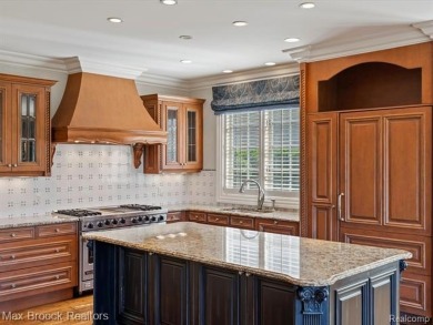 This exquisite French Country-inspired residence is situated on Forest Lake Country Club in Michigan - for sale on GolfHomes.com, golf home, golf lot