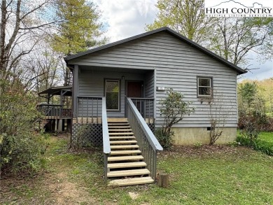 2bdr/1 1/2 bath cottage with great covered porch overlooking the on Land Harbor Golf Course in North Carolina - for sale on GolfHomes.com, golf home, golf lot
