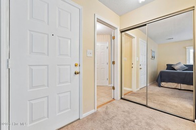 Discover your perfect retreat in this beautifully appointed on Oyster Bay Golf Links in North Carolina - for sale on GolfHomes.com, golf home, golf lot