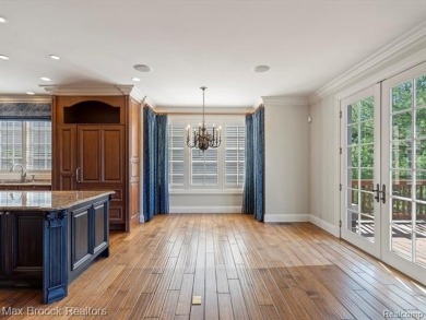 This exquisite French Country-inspired residence is situated on Forest Lake Country Club in Michigan - for sale on GolfHomes.com, golf home, golf lot