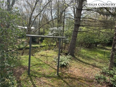2bdr/1 1/2 bath cottage with great covered porch overlooking the on Land Harbor Golf Course in North Carolina - for sale on GolfHomes.com, golf home, golf lot