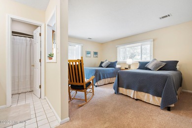 Discover your perfect retreat in this beautifully appointed on Oyster Bay Golf Links in North Carolina - for sale on GolfHomes.com, golf home, golf lot