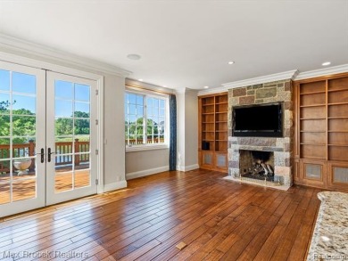 This exquisite French Country-inspired residence is situated on Forest Lake Country Club in Michigan - for sale on GolfHomes.com, golf home, golf lot