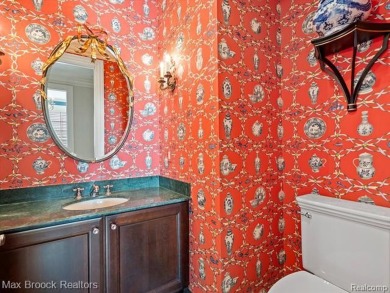 This exquisite French Country-inspired residence is situated on Forest Lake Country Club in Michigan - for sale on GolfHomes.com, golf home, golf lot
