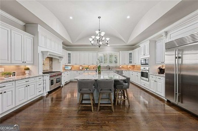 An architectural masterpiece in a gated community, on the 5th on Echelon Golf Club in Georgia - for sale on GolfHomes.com, golf home, golf lot