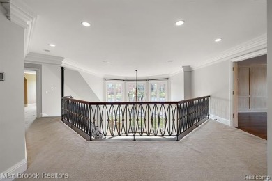 This exquisite French Country-inspired residence is situated on Forest Lake Country Club in Michigan - for sale on GolfHomes.com, golf home, golf lot