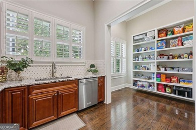 An architectural masterpiece in a gated community, on the 5th on Echelon Golf Club in Georgia - for sale on GolfHomes.com, golf home, golf lot